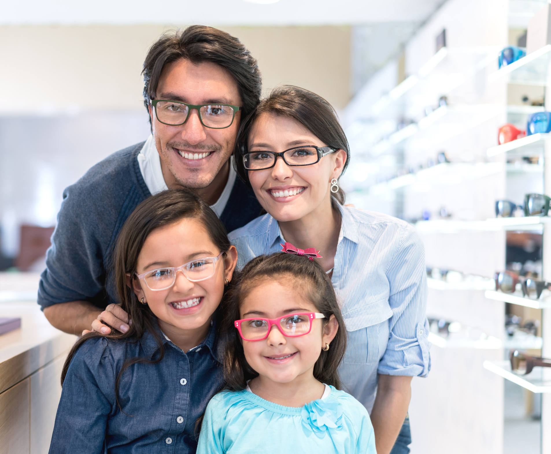 Eye care durham - Family buying glasses at the optician's shop